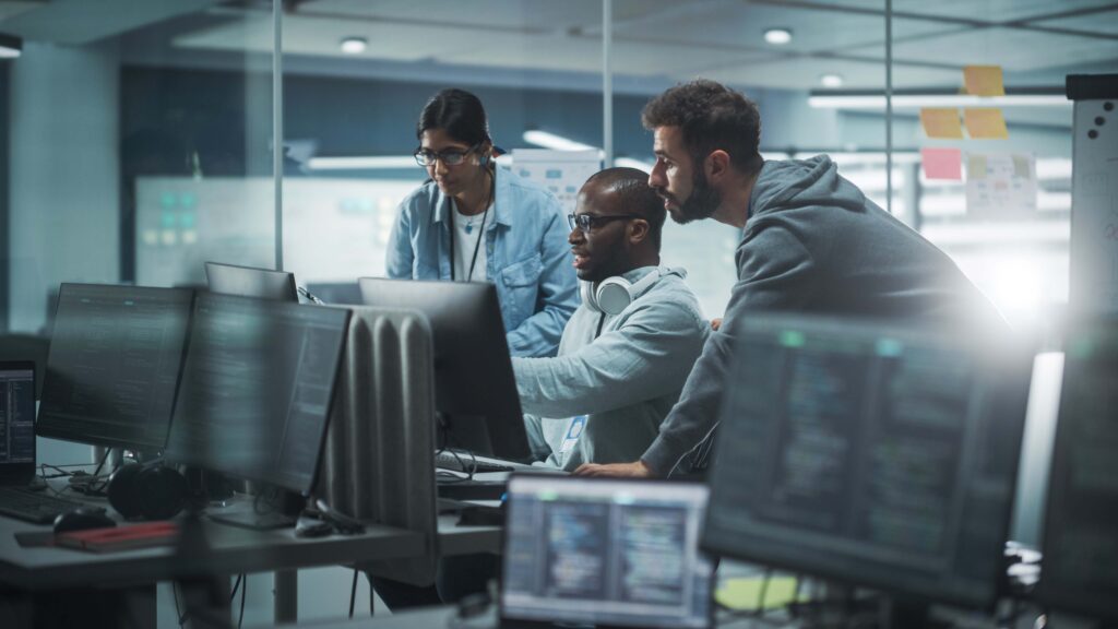 People at work looking at a computer screen