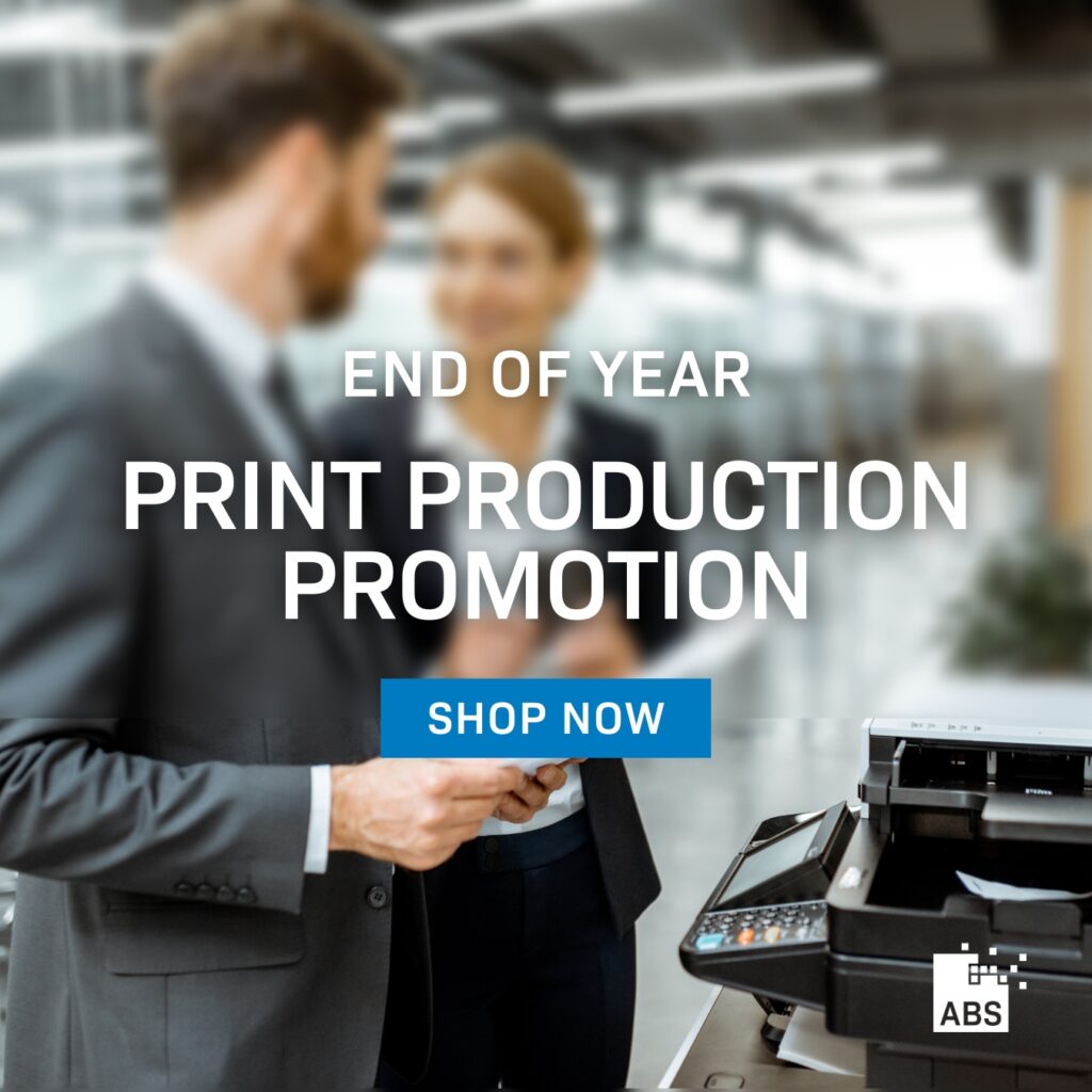 Print production promotion image, with two people in front of printer