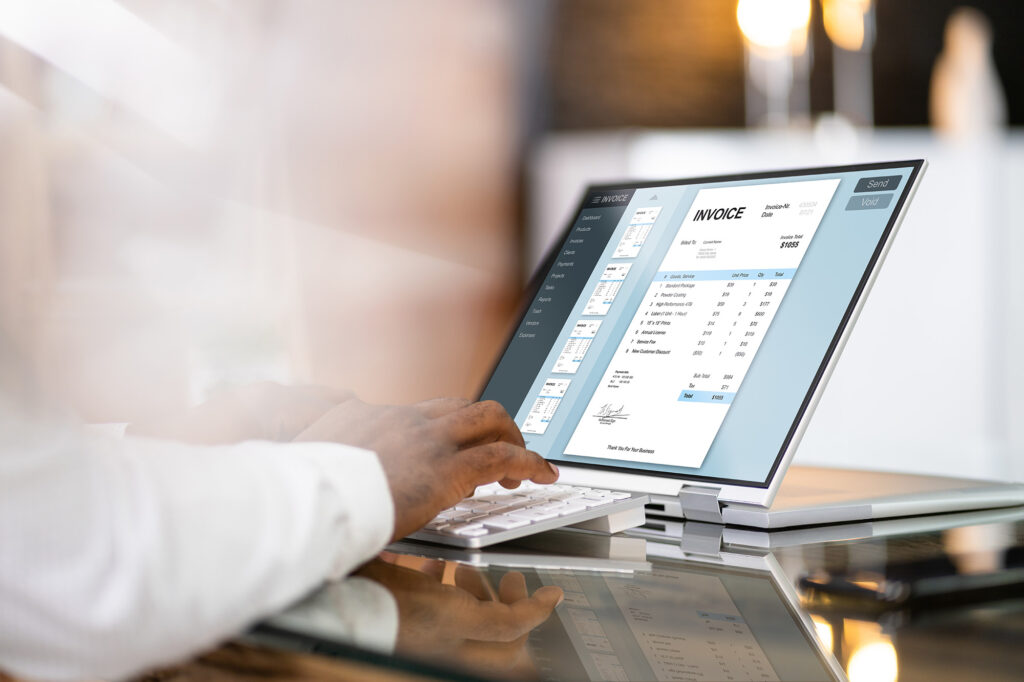 A person creating an invoice